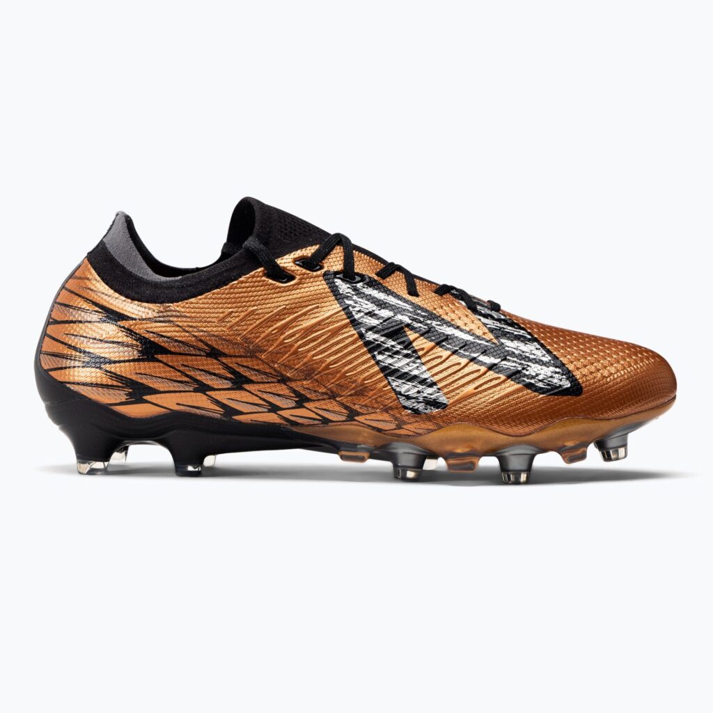 Футбольные бутсы New Balance Tekela Pro Low Laced V4+ FG copper
