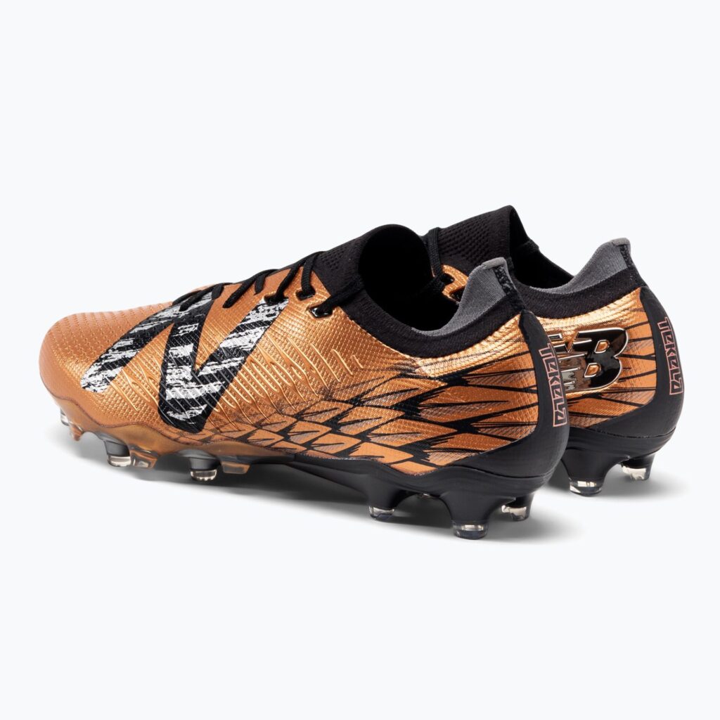 Футбольные бутсы New Balance Tekela Pro Low Laced V4+ FG copper
