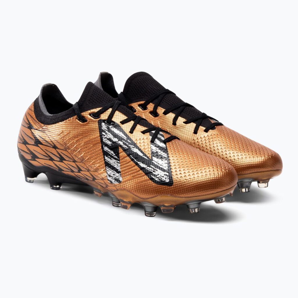 Футбольные бутсы New Balance Tekela Pro Low Laced V4+ FG copper