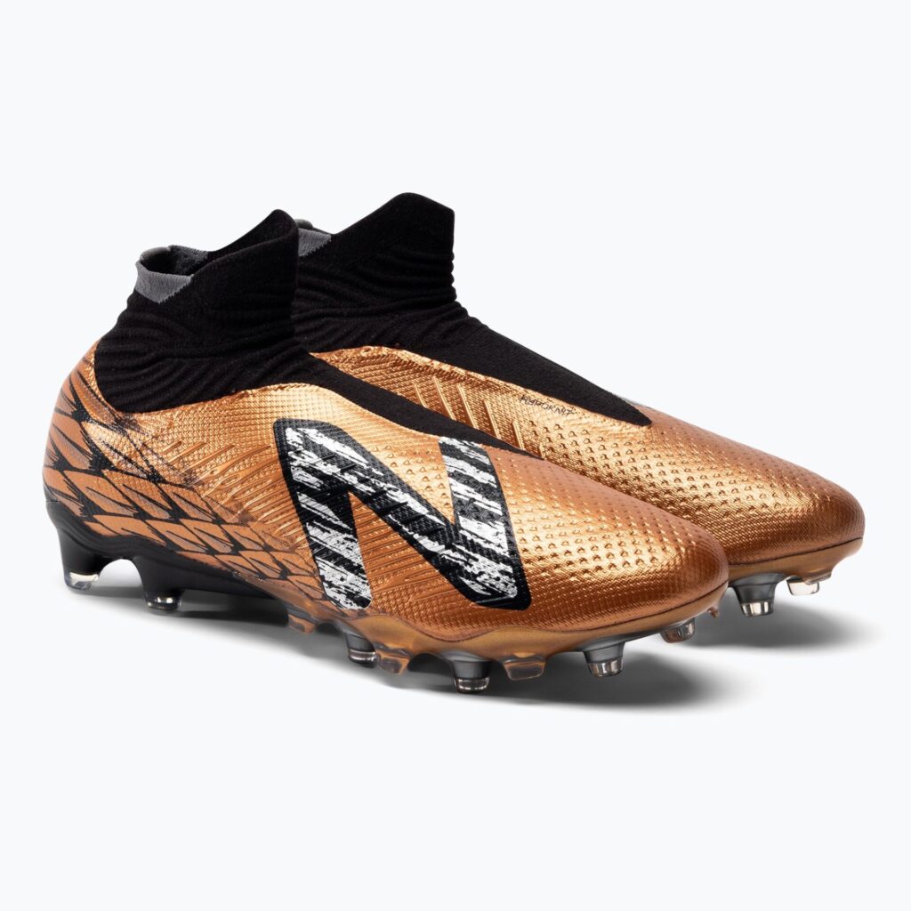Футбольные бутсы New Balance Tekela Pro V4+ FG copper