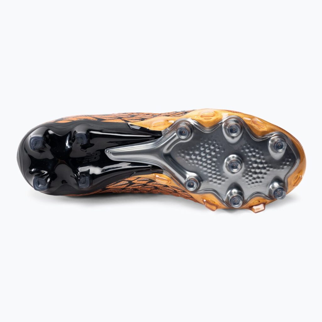 Футбольные бутсы New Balance Tekela Pro V4+ FG copper