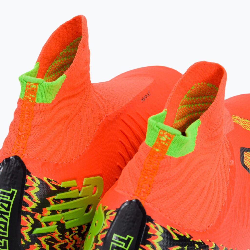 Футбольные бутсы New Balance Tekela Pro V4+ FG neon dragonfly