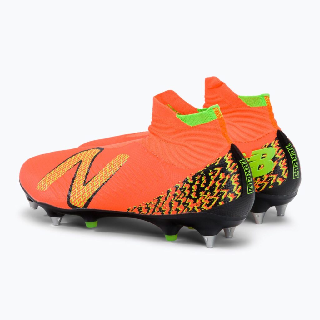Футбольные бутсы New Balance Tekela Pro V4+ SG neon dragonfly
