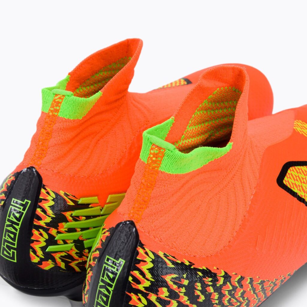 Футбольные бутсы New Balance Tekela Pro V4+ SG neon dragonfly