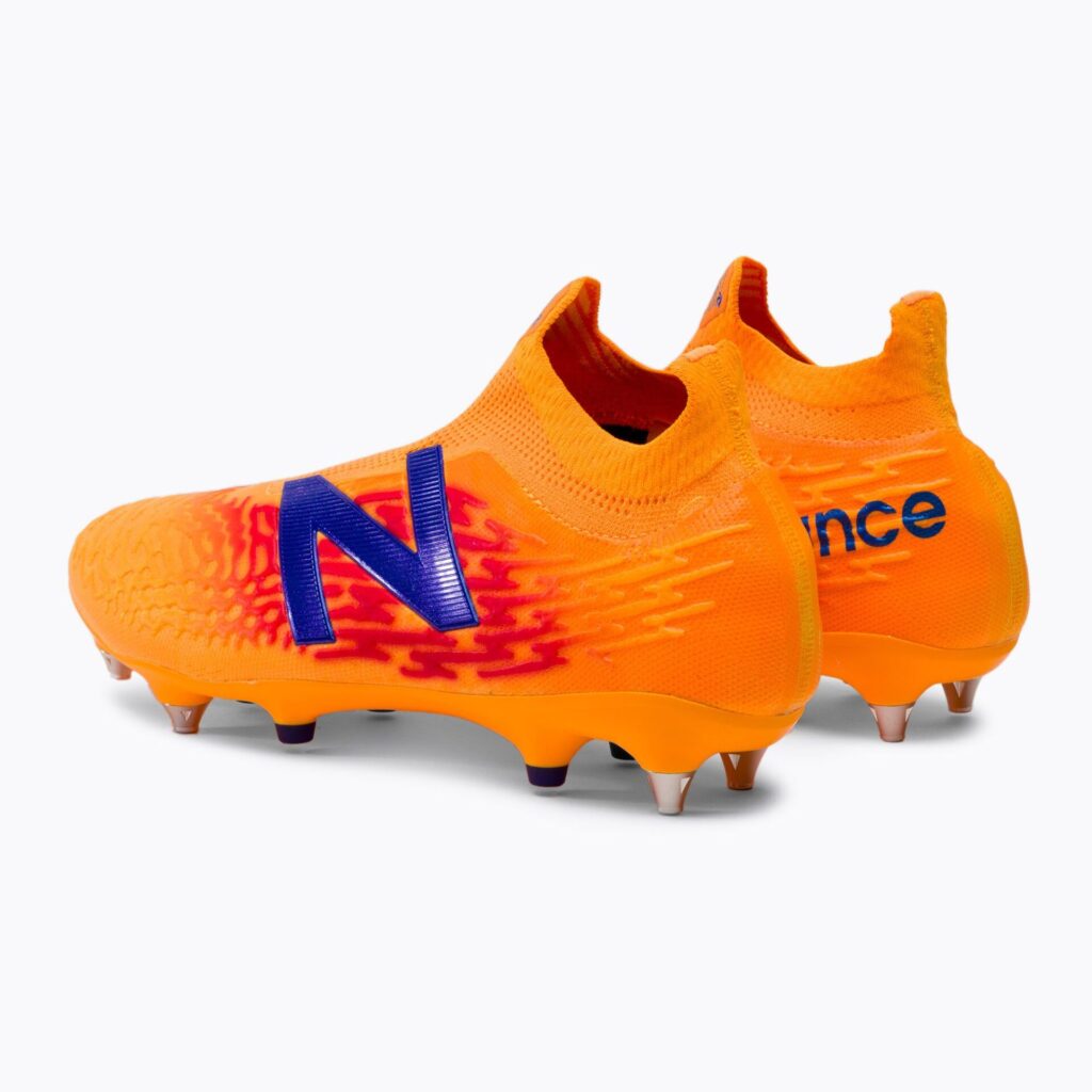 Футбольные бутсы New Balance Tekela V3+ Pro SG impulse/vibrant orange