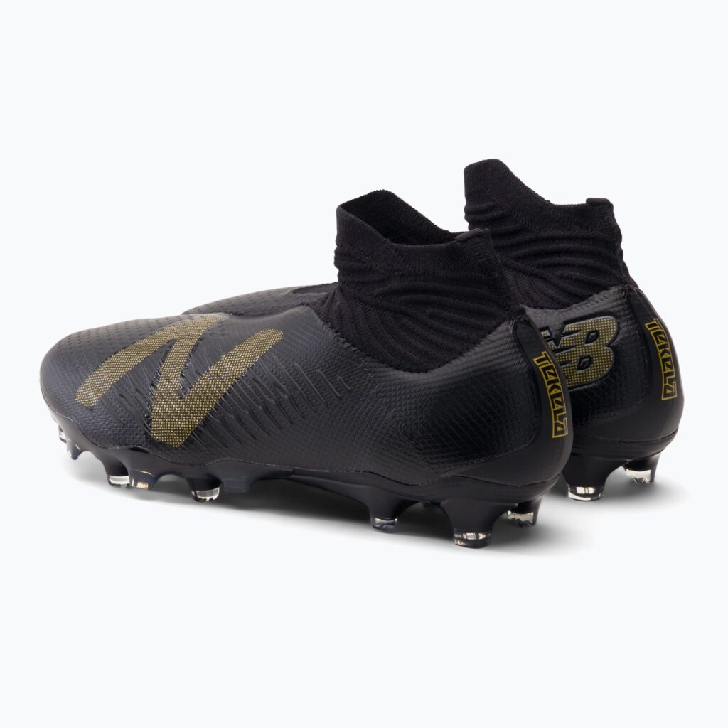 Футбольные бутсы New Balance Tekela V4 Pro FG black/gold