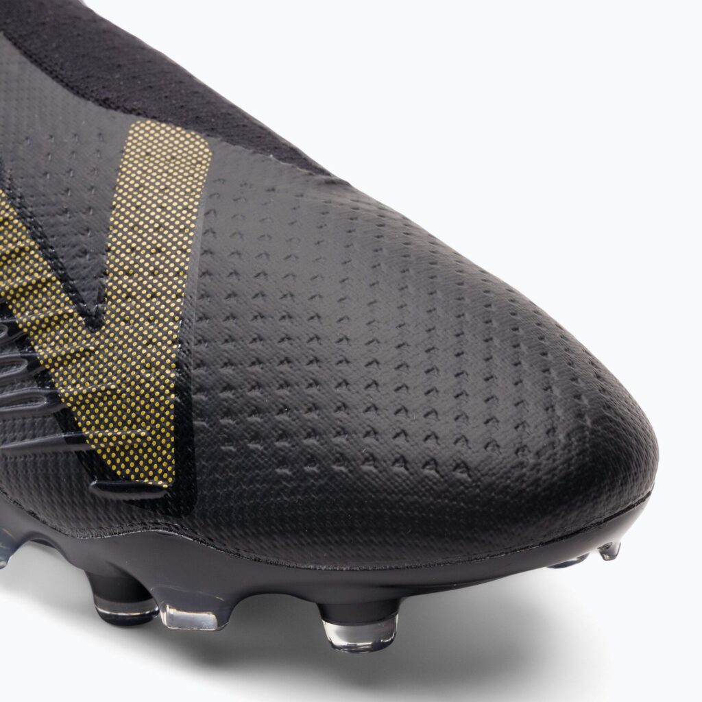 Футбольные бутсы New Balance Tekela V4 Pro FG black/gold