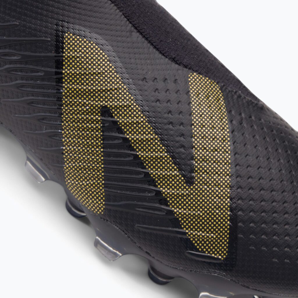 Футбольные бутсы New Balance Tekela V4 Pro FG black/gold