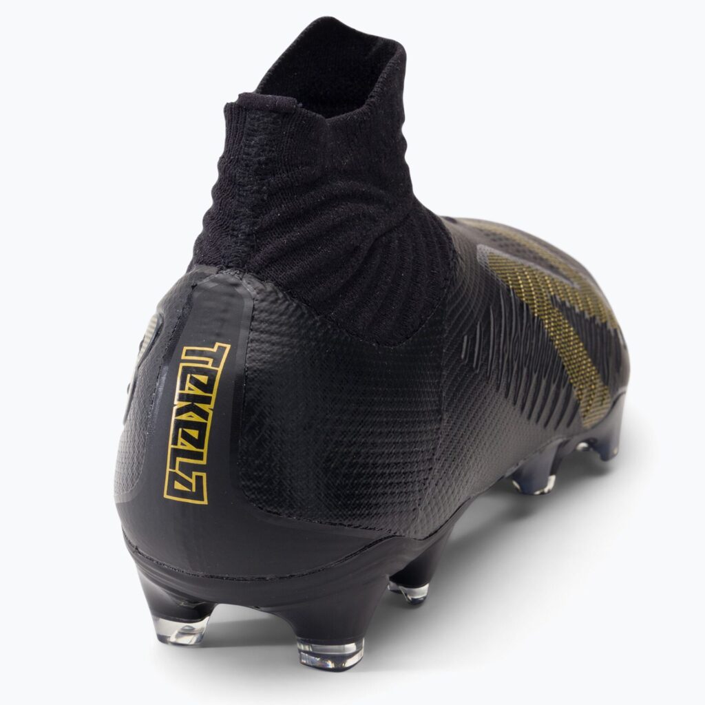 Футбольные бутсы New Balance Tekela V4 Pro FG black/gold