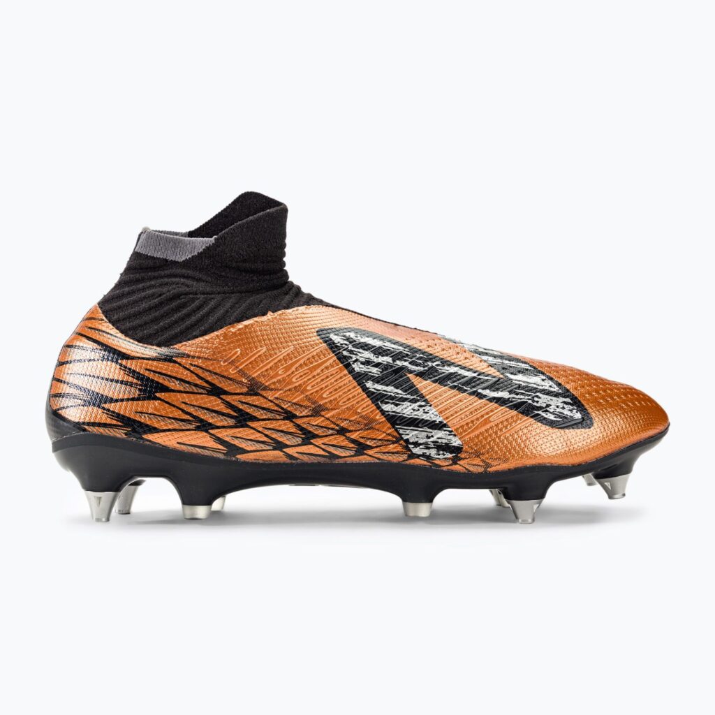 Футбольные бутсы New Balance Tekela V4 Pro SG copper