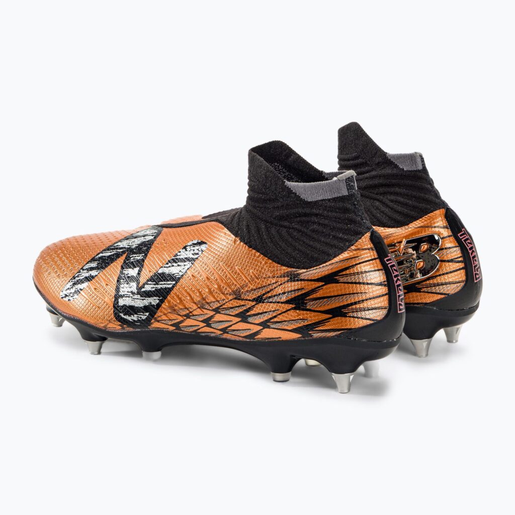 Футбольные бутсы New Balance Tekela V4 Pro SG copper