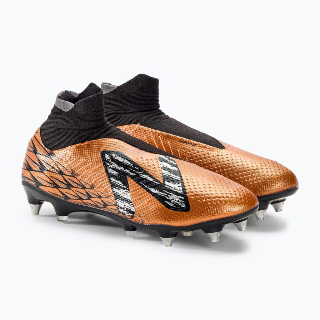 Футбольные бутсы New Balance Tekela V4 Pro SG copper