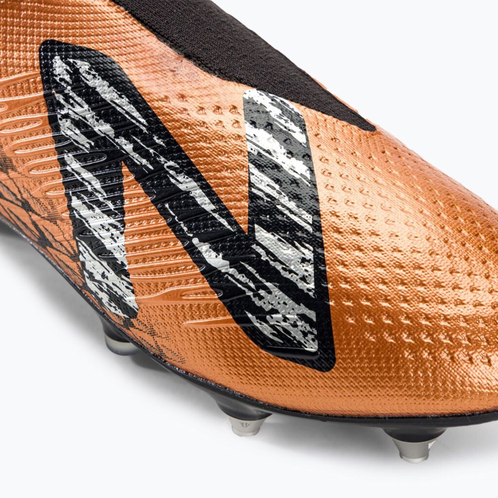 Футбольные бутсы New Balance Tekela V4 Pro SG copper