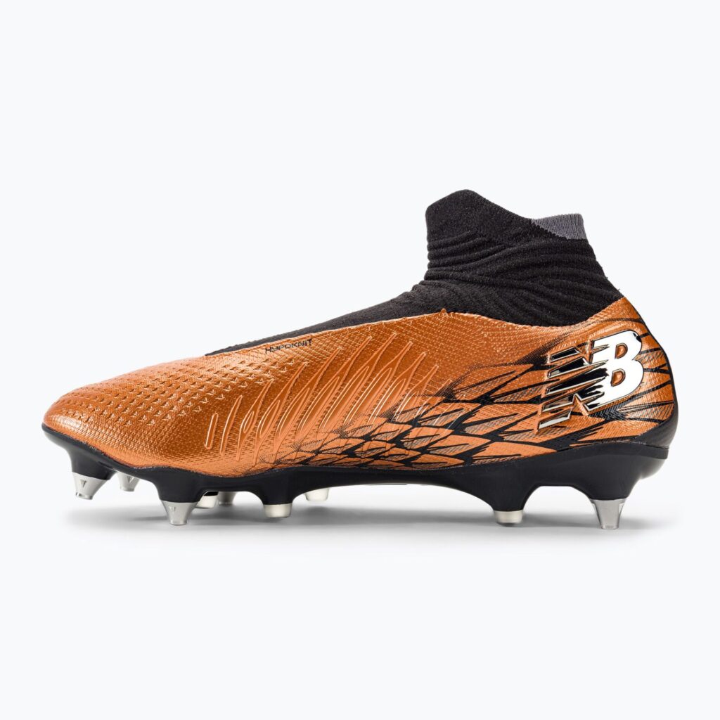 Футбольные бутсы New Balance Tekela V4 Pro SG copper